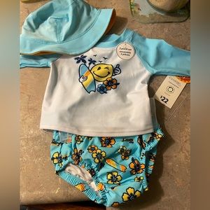 Selling 0-3. Swimming set with matching hat. Brand New With Tags